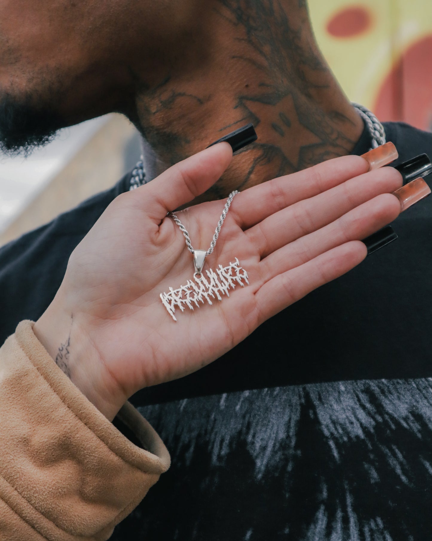 “Lightning Logo Necklace”