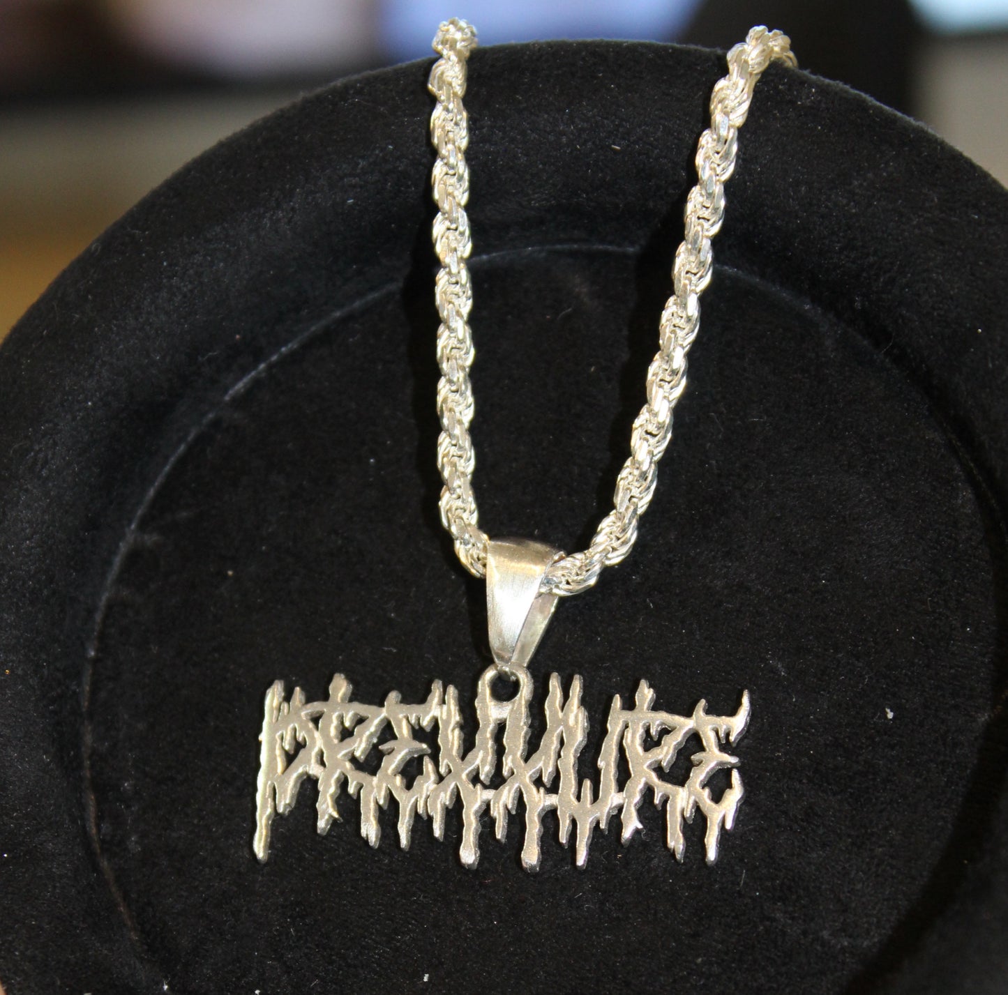 “Lightning Logo Necklace”